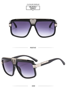 Detail of square sunglasses with black frames and metallic grid pattern hinges