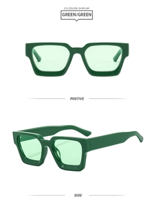 Detailansicht der dunkelgrünen quadratischen Sonnenbrille mit breiten Bügeln