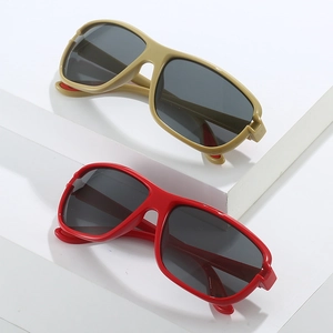 Close-up of Y2K square wrap sunglasses in red and khaki on white geometric stands