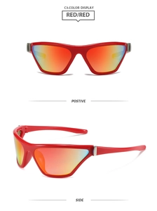 Détail des lunettes de soleil sportives Y2K avec monture rouge et verres dégradés orange