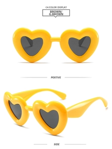 Front and side view of yellow heart-shaped Y2K sunglasses with dark grey lenses
