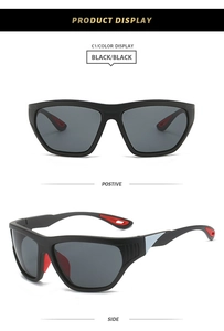 Detail der mattschwarzen Sportsonnenbrille mit roten Gummibügeln und Belüftungsschlitzen