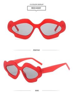 Detailed views of red lip-shaped Y2K sunglasses with grey lenses and wavy frames