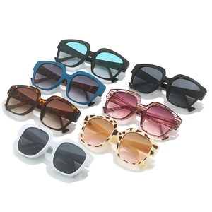 Row of stylish square frame sunglasses in multiple colors with gradient lenses