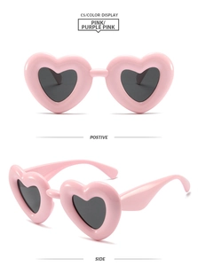 Detailed views of pink inflatable heart-shaped sunglasses with stylish Y2K aesthetic