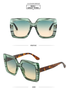 Detailed front and side views of square sunglasses with green wood grain frames and gradient lenses