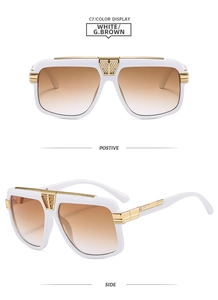 Detailed view of white square sunglasses with gold metal mesh accents and gradient lenses