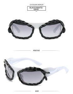 Macro detail of Y2K sunglasses featuring unique black braided texture on white frames
