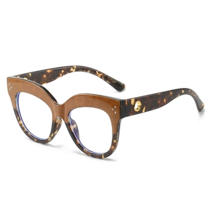 Fashionable oversized cat-eye tortoiseshell glasses frame with metallic rivet accents