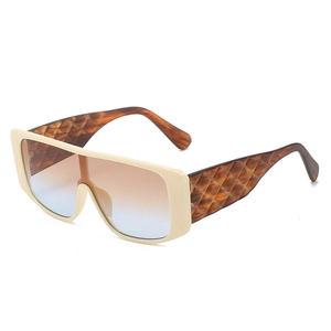 Oversized shield sunglasses with gradient lenses and textured tortoise shell arms
