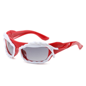 Y2K style red and white Christmas party sunglasses with bold festive plastic frame