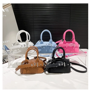 Five assorted colors of mini vintage shell bags in high-quality textured leather