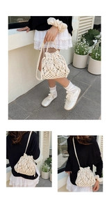 Detail of hand-woven straw bucket bag with hollow patterns and adjustable drawstring