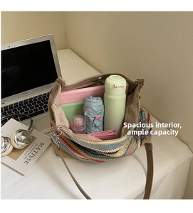Large capacity woven tote bag interior showing laptop and daily essentials storage