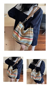 Detail of bohemian colorful striped woven tote with brown leather strap and metal hooks