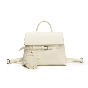 Elegant creamy white dual-purpose fashion backpack with heart lace charm accessory