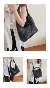 Close-up of black hand-woven hobo shoulder bag and tote bag with intricate texture