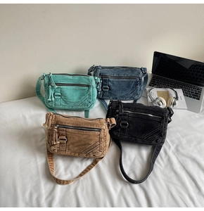 Group display of retro denim crossbody bags in mint green, blue, khaki and black