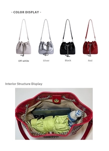 Detail view of bucket bag interior capacity showing phone and umbrella storage