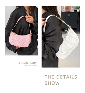 Detail showing frayed edge hobo bags in pink and white with unique quilted texture