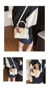 Détail d'un sac à main tressé beige avec foulard en soie et fermoir doré chic