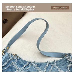 Detail of denim shoulder bag with fringe edges, diamond quilting and leather strap
