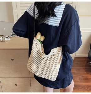 Detail of hand-woven cotton hollow out mesh tote bag with lightweight vintage texture