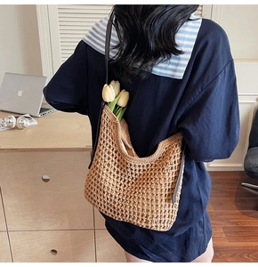 Detail of woven mesh cotton bag with fabric lining and yellow tulips in lifestyle setting