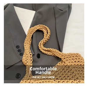 Detailed close-up of handmade crochet texture and sturdy handle of the woven tote bag