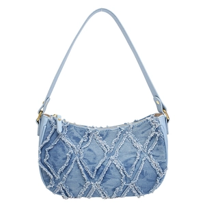 Light blue denim hobo bag with quilted diamond pattern and frayed fringe details