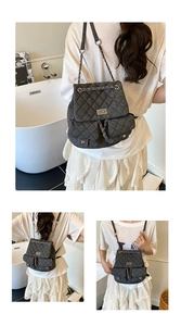 Detail of grey quilted backpack featuring denim texture, metal twist lock and chain straps