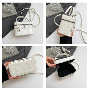 Detail views of white crocodile pattern mini square bag with handle and zipper