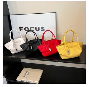 Litchi pattern leather bucket bags in four colors with decorative silver charms