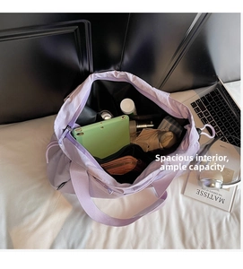 Macro shot showing internal pockets and large storage capacity for laptop and daily items