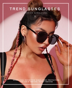 Detail of square oversized metal sunglasses with sparkling rhinestone hinges on model