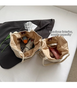 Macro detail of inner lining and storage space in a woven cotton hollow beach bag