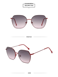 Front and side views of red polygon metal sunglasses with grey pink gradient lenses