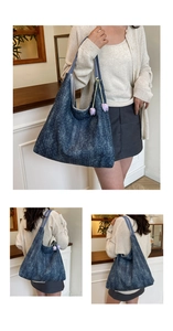 Detail of a denim tote bag with white polka dots and purple tulip charm attachments
