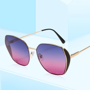 Fashion oversized cat-eye metal sunglasses with blue-pink gradient lenses on a blue stand