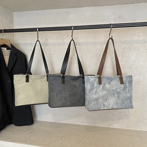 Minimalist large capacity tote bag set in olive, grey, and blue with gold lettering