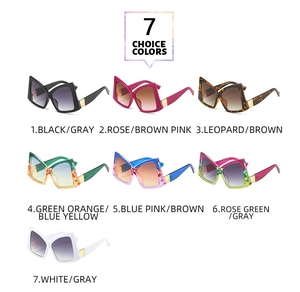 Detailed flat lay of oversized butterfly sunglasses in seven gradient color options