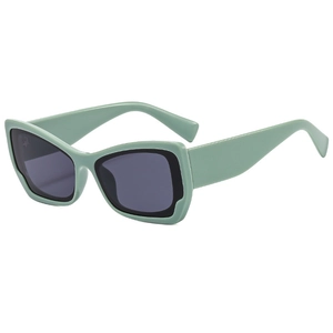 Retro mint green cat eye sunglasses with gray lenses and unique double-layered frames
