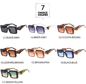 Detail view of bold square sunglasses in 7 frame colors with triangle metal accent