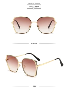 Detailansicht der goldenen eckigen Sonnenbrille mit roten Verlaufsgläsern vorne
