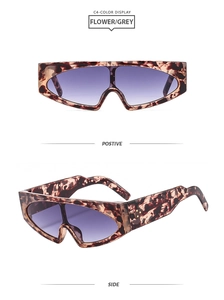 Detail view of oversized tortoise shell sunglasses with purple gradient lenses