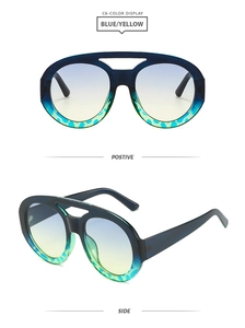 Detail view of large oval sunglasses featuring blue and yellow gradient frames and lenses