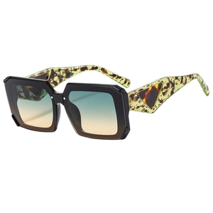 Square fashion sunglasses with gradient lenses and marble textured temples on white background
