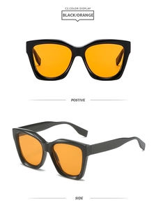 Front and side view of oversized square sunglasses with black frame and orange lenses