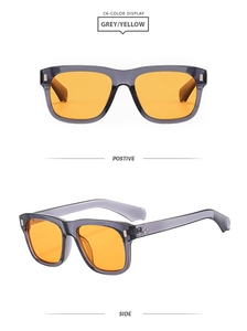 Détails de lunettes de soleil carrées grises transparentes avec verres jaunes et rivets