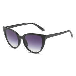 Retro cat-eye sunglasses with glossy black frames and purple gradient lenses in 45-degree view